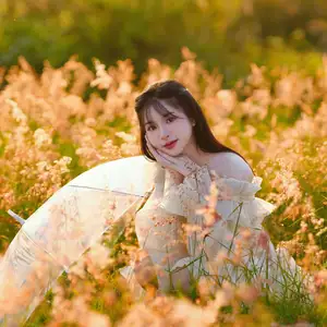 Golden Hour Dream: Ethereal Beauty in White Amidst a Blooming Field-16