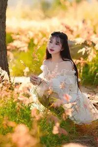 Golden Hour Dream: Ethereal Beauty in White Amidst a Blooming Field-13