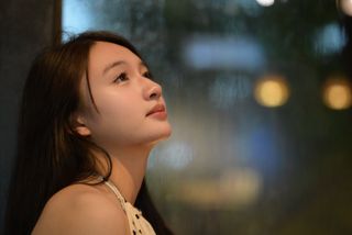 Elegant Beauty of a Young Vietnamese Girl in a Cafe Setting-2
