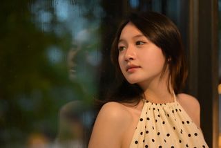 Elegant Beauty of a Young Vietnamese Girl in a Cafe Setting-3