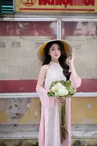 VGU No171: Vietnamese Beauty Graces a Flower Garden in Elegant Pink Ao Dai and Conical Hat-4