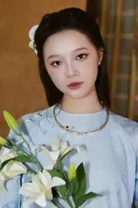 Serene Beauty: Graceful Young Woman in Traditional Attire with White Lilies-2