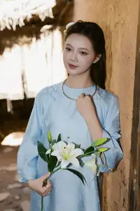 Serene Beauty: Graceful Young Woman in Traditional Attire with White Lilies-1