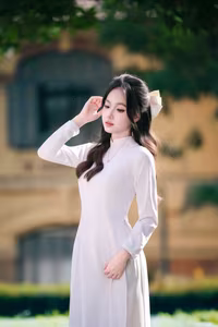 VGU No.57: Elegant Vietnamese Student in White Ao Dai, Pure Beauty Captivates.-4