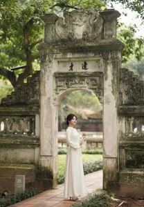 VGU No.65: Explore Vietnam's Traditional Beauty: Ao Dai Gracefully Meets Ancient Culture-10