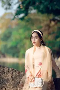 Graceful Vietnamese Beauty: Captivating Charm of a Girl in Elegant Traditional Attire-3