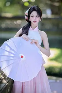 Discover the gentle charm of an Asian beauty in elegant attire, exuding grace and allure 1000025175-8