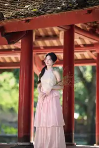 Discover the gentle charm of an Asian beauty in elegant attire, exuding grace and allure 1000025175-13