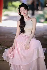 Discover the gentle charm of an Asian beauty in elegant attire, exuding grace and allure 1000025175-11