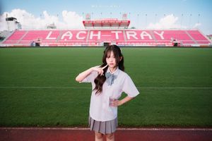 Young Schoolgirl in Uniform on Running Track - Fresh Youthful Beauty-0