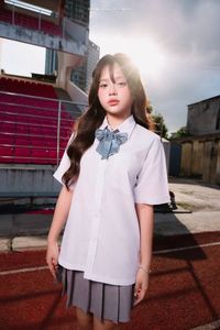 Young Schoolgirl in Uniform on Running Track - Fresh Youthful Beauty-4