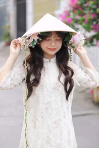 VGU No.143: Discover the Ethereal Beauty of a Vietnamese Girl in Ao Dai and Floral Conical Hat-9