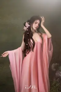 Lilly Luta Transforms into 'Living Doll' in Flowing Pink Silk Gown, Fairytale Beauty Unveiled-2