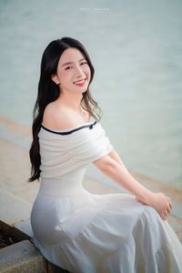 Radiant Beauty of a Vietnamese Girl with a Bright Smile in Nature-1