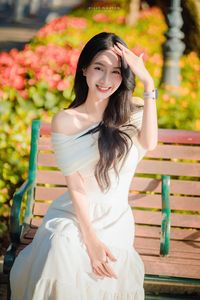 Radiant Beauty of a Vietnamese Girl with a Bright Smile in Nature-12