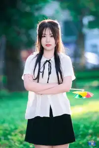 Radiant Youth: Vietnamese Girl's Bright Smile with Pinwheel in Golden Sunlight-3