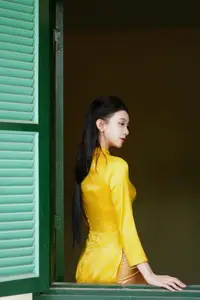 Graceful Vietnamese Beauty in Elegant Yellow Ao Dai-1