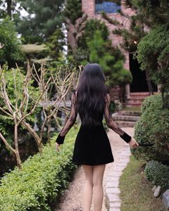 XVG No.3: Elegant Girl in Black Dress Amidst Ancient Garden Charm-2