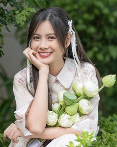 Elegant Vietnamese Woman with Pure Lotus Flowers-4