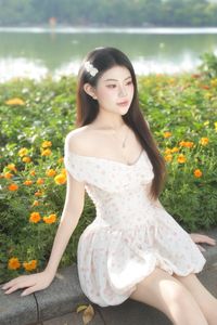Graceful Woman in White Floral Dress Amidst Serene Summer Nature-5