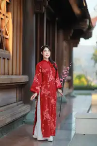 Elegant Red Ao Dai: Vietnamese Beauty with Cherry Blossoms in Ancient Architecture-2