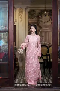 Graceful Pink Ao Dai Beauty: Elegant Vietnamese Woman with Alluring Pearl Jewelry-4