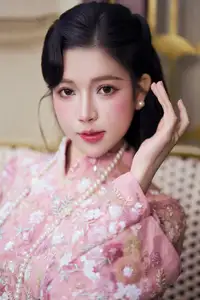Graceful Pink Ao Dai Beauty: Elegant Vietnamese Woman with Alluring Pearl Jewelry-1
