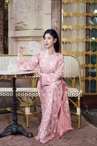 Graceful Pink Ao Dai Beauty: Elegant Vietnamese Woman with Alluring Pearl Jewelry-5