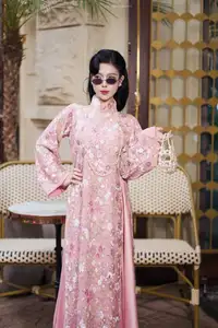 Graceful Pink Ao Dai Beauty: Elegant Vietnamese Woman with Alluring Pearl Jewelry-8