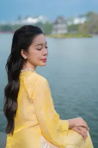 Graceful Vietnamese Beauty: Elegant Woman in Modern Traditional Attire Captures Asian Charm-7