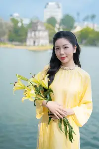 Graceful Vietnamese Beauty: Elegant Woman in Modern Traditional Attire Captures Asian Charm-6