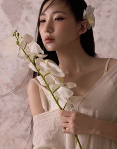 Ethereal Asian Beauty: Woman in Straw Hat with White Flowers-1