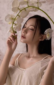 Ethereal Asian Beauty: Woman in Straw Hat with White Flowers-0