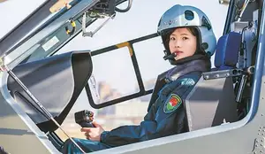 Stunning Female Military Pilot Captivates Viewers with Fairy-like Beauty-8