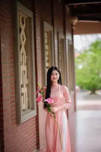 Elegant Vietnamese Beauty Amidst Ancient Architecture-0