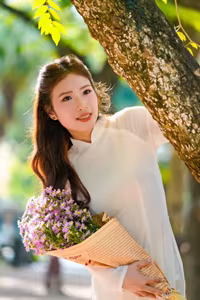 XVG No.55: Vietnamese Ao Dai Charm A Radiant Smile Embracing Youth and Tradition Under Golden Sun-2
