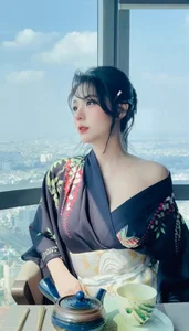 Timeless Elegance: A Serene Tea Moment Above the Clouds-3