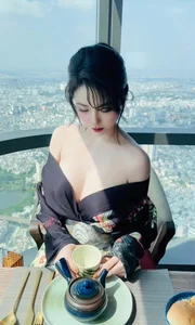 Timeless Elegance: A Serene Tea Moment Above the Clouds-6