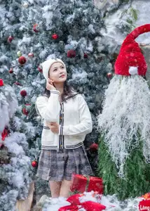 Charming Winter Girl Amidst Beautiful Christmas Snowfall-10
