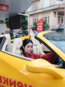 Stunning Red Ao Dai Fashion: TikTok Influencer Bo Chanh Poses with a Luxury Yellow Supercar in Elegant Traditional Vietnamese Style-6
