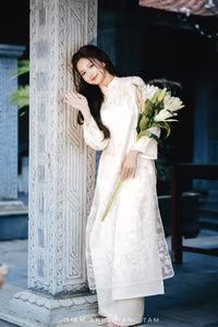 VGU No.131: Explore the Ethereal Beauty of a Vietnamese Lady in White Ao Dai with Lilies-10
