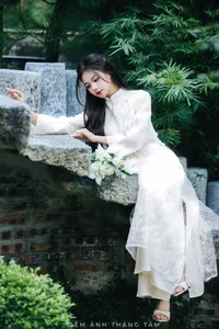 VGU No.131: Explore the Ethereal Beauty of a Vietnamese Lady in White Ao Dai with Lilies-15