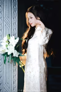 VGU No.131: Explore the Ethereal Beauty of a Vietnamese Lady in White Ao Dai with Lilies-13