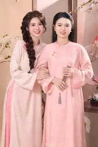 Radiant Smile of a Vietnamese Girl in Modern Ao Dai and Elegant Fan-2