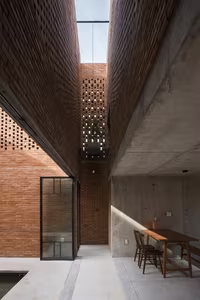 Astonishing architecture of the sloped roof house in Long An resembling a brick kiln hiding unique interior spaces-4