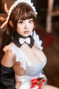 Coser Qiqi Nanako: Adorable Cow Maid Cosplay Captivates Fans-14