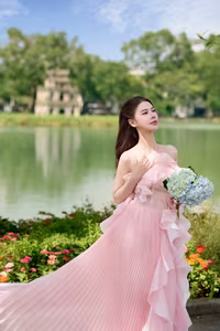 XVG No.24: Discover the Graceful Beauty of a Young Woman in Pink by Hoan Kiem Lake-2