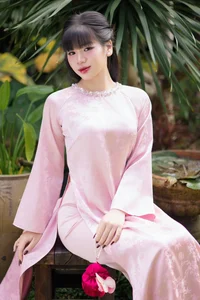 Gentle Youthful Beauty in Pink Silk Ao Dai-6