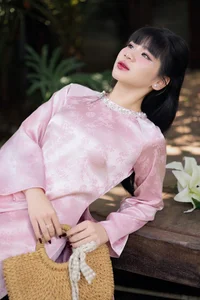 Gentle Youthful Beauty in Pink Silk Ao Dai-0