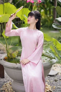 Gentle Youthful Beauty in Pink Silk Ao Dai-2